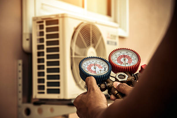Professional Air Conditioning Service technician working in Siluria, AL
